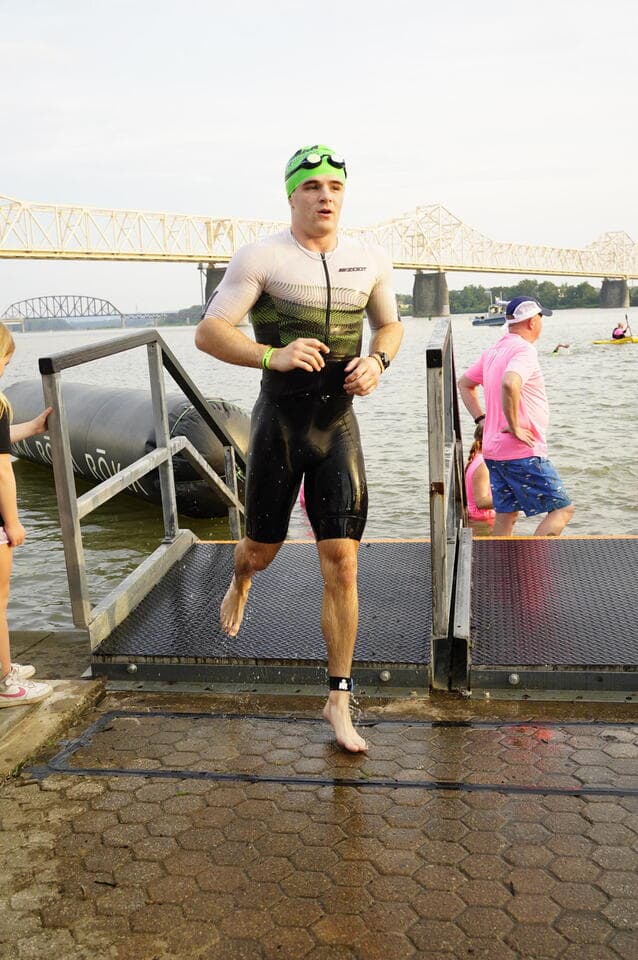 Joey Lewand exiting the swim at IRONMAN 70.3 Louisville